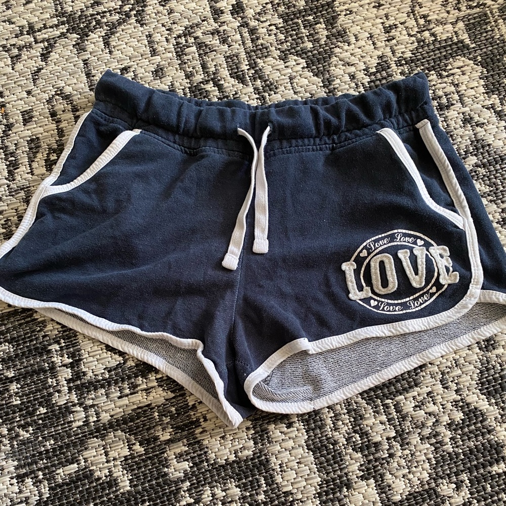 Black “Love” shorts from REFLEX